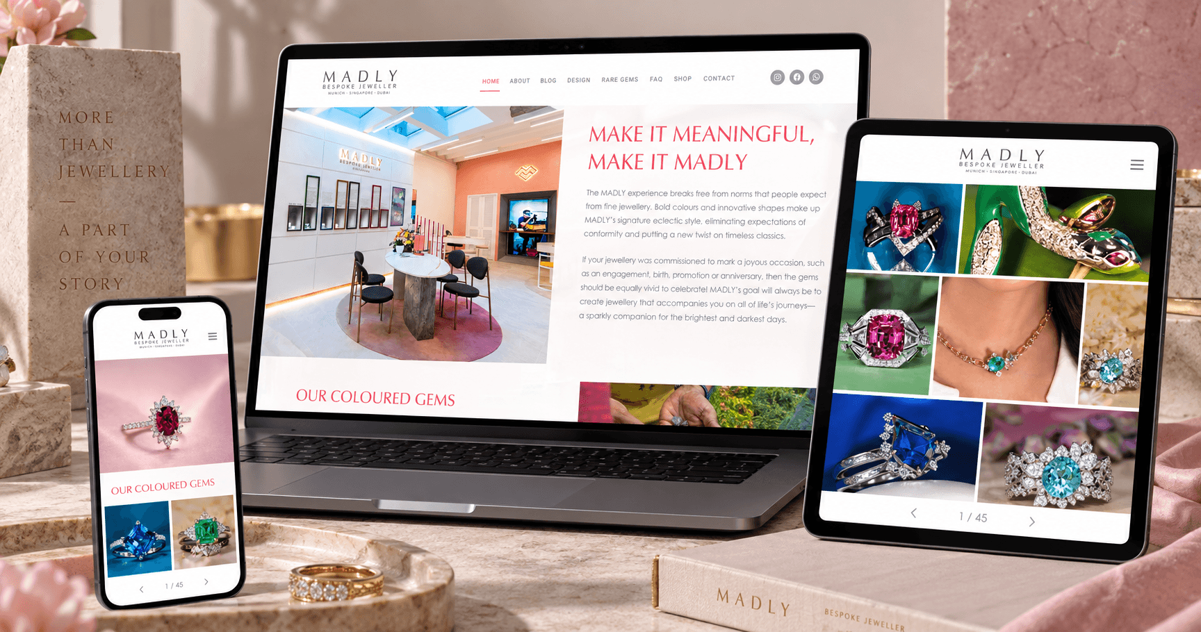 The MADLY Bespoke Jeweller website on a laptop, tablet and phone, showing a colourful showroom photo and a grid of gemstone rings.